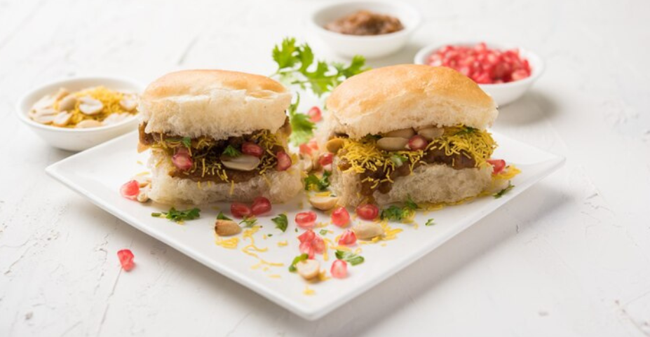 Dabeli is a popular Gujarati street food that's loved for its unique blend of sweet, tangy, and spicy flavors